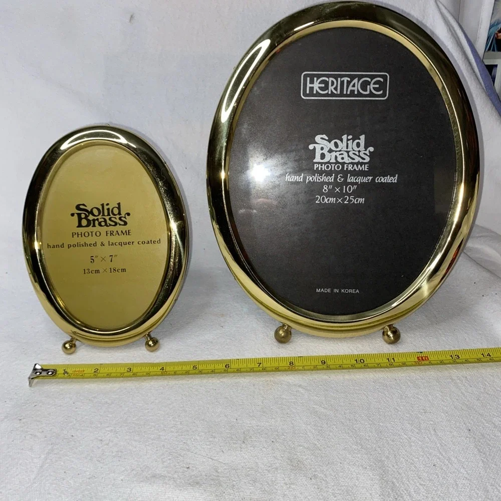 2 Solid Brass Oval Pictures Frames. One 5x7